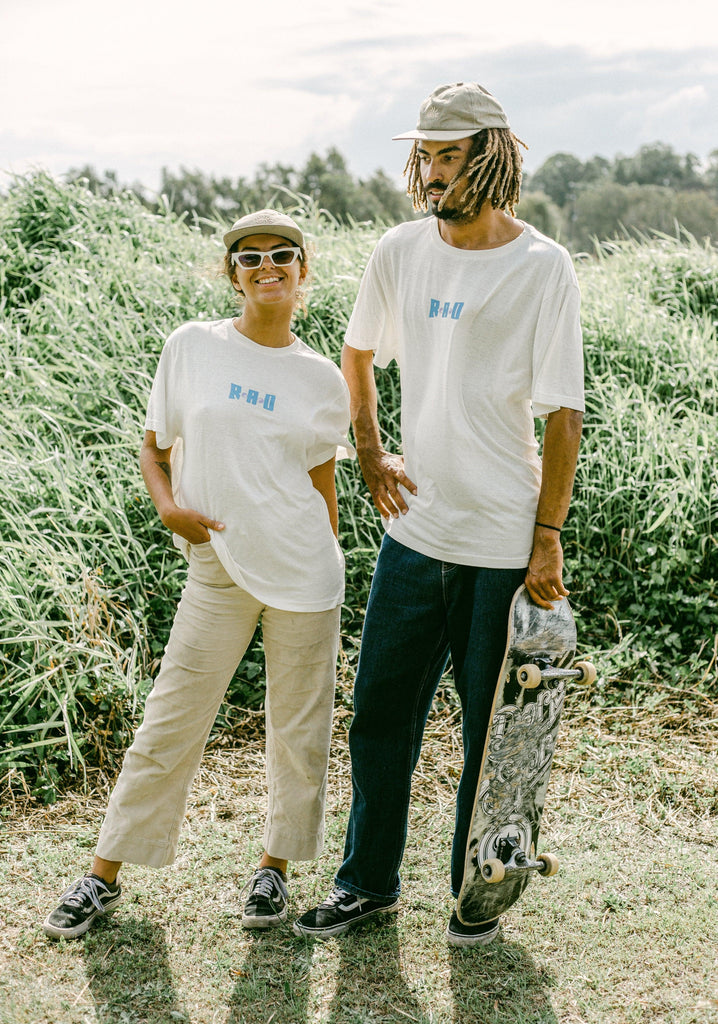 Two skaters model in Byron Bay field in white oversized hemp t shirts